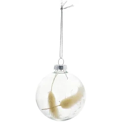 Boule de Noël en verre avec feuille séchée