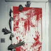 Décoration de porte Halloween effet ensanglanté