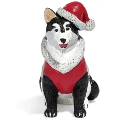 Personnage village de Noël chien avec manteau et bonnet rouge