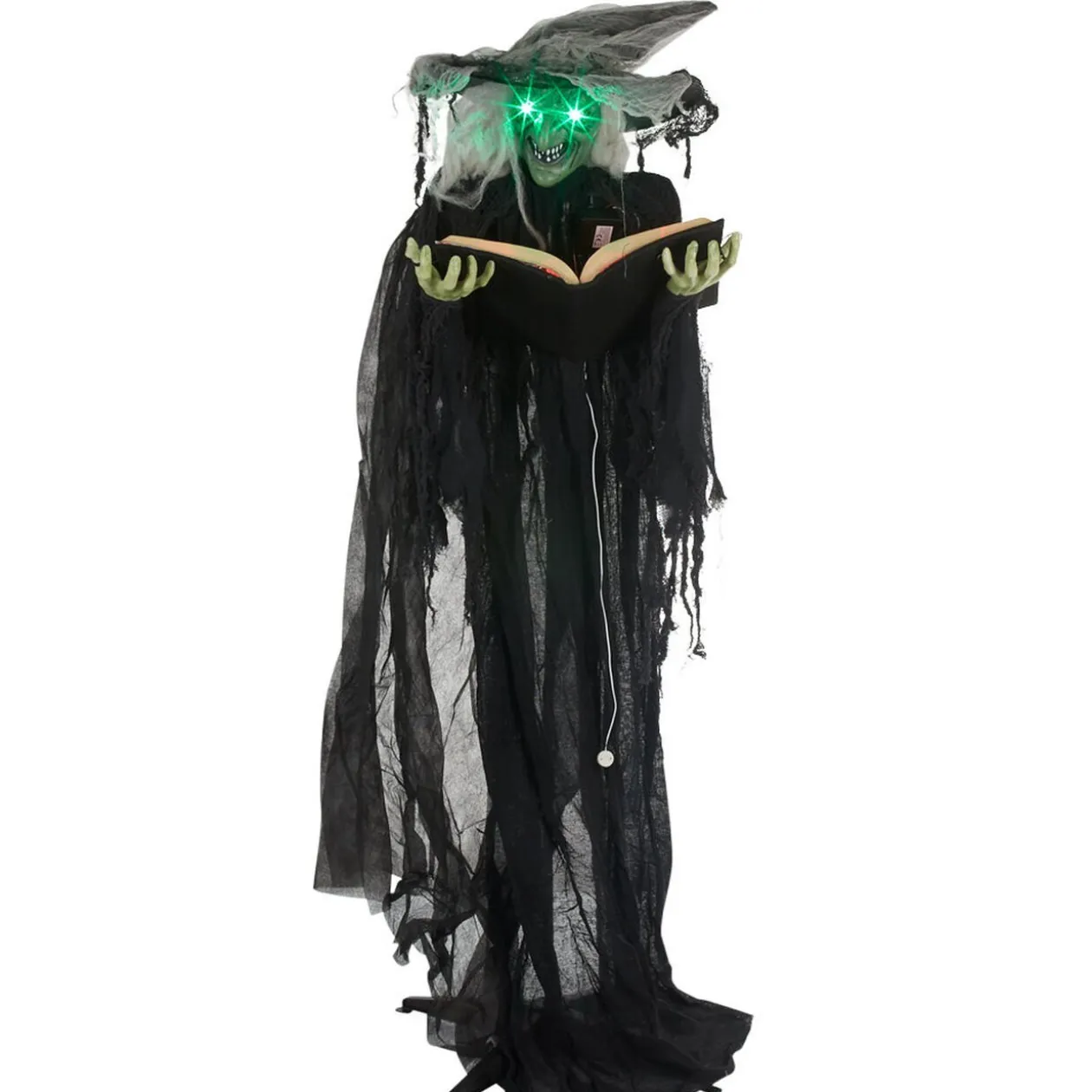 Sorcière debout tenant un livre lumineuse et sonore